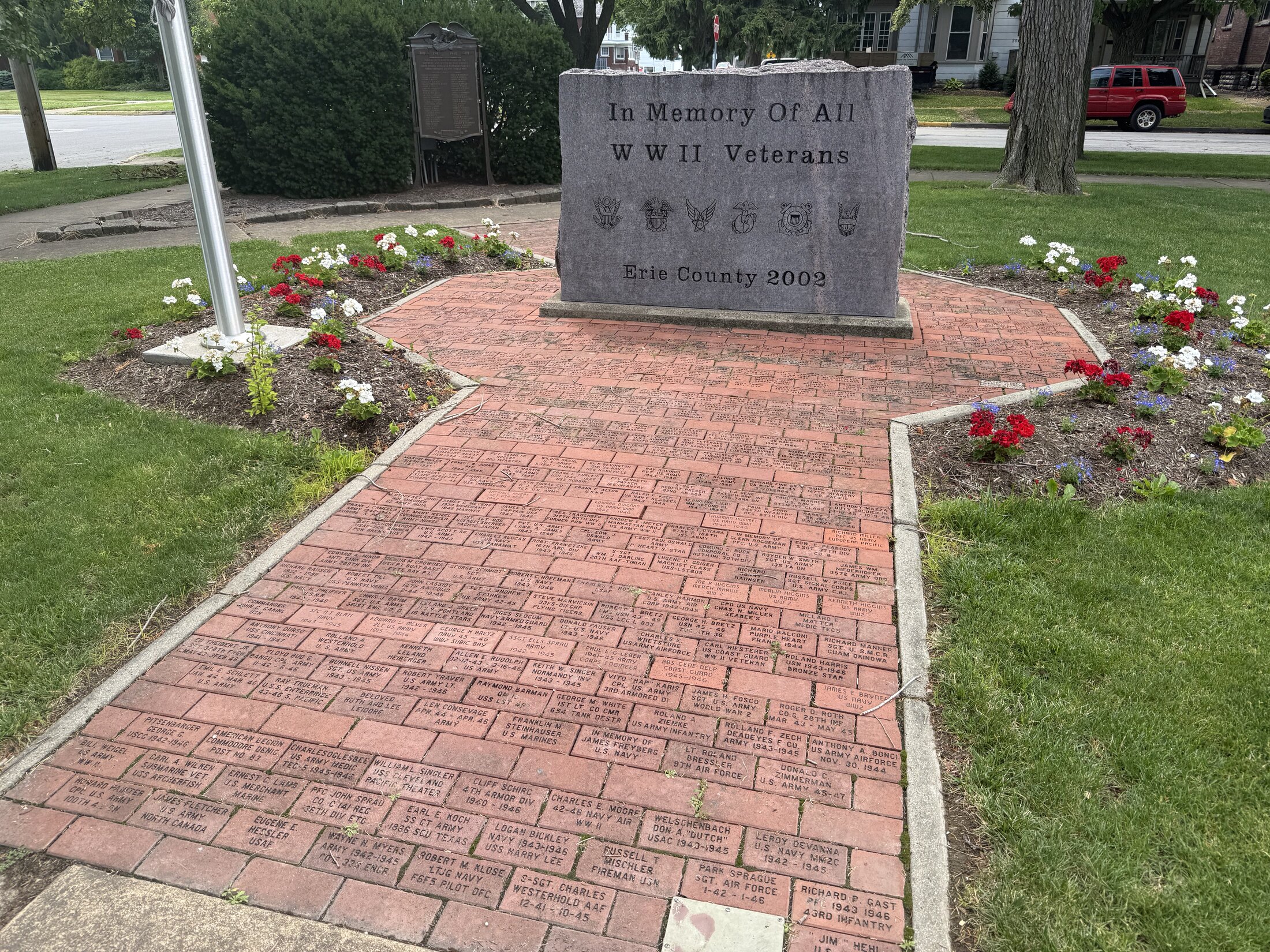 Completed Erie County Veterans Park monument area with engraved brick paving and new planting